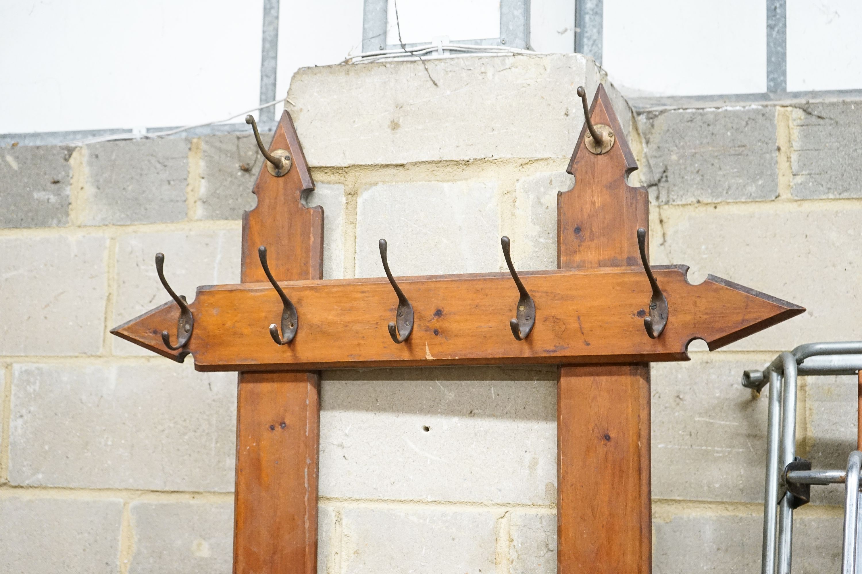 A late Victorian pitch pine hall stand, width 96cm, height 212cm